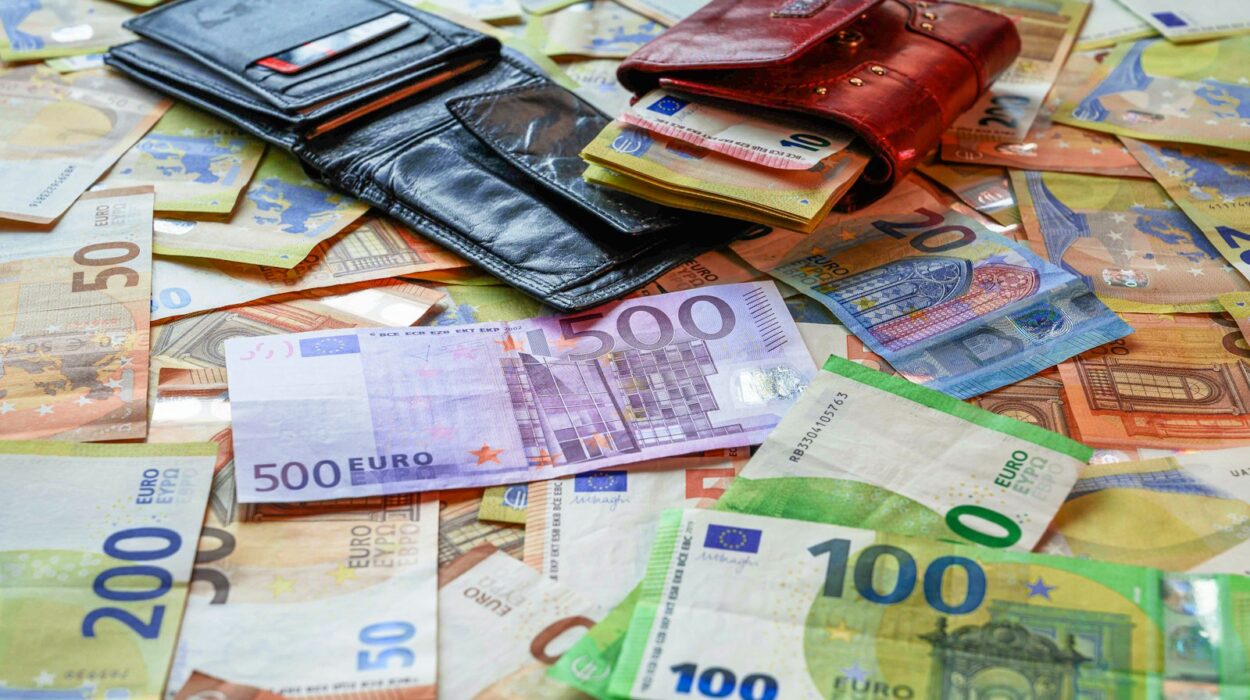 a pile of money sitting on top of a table